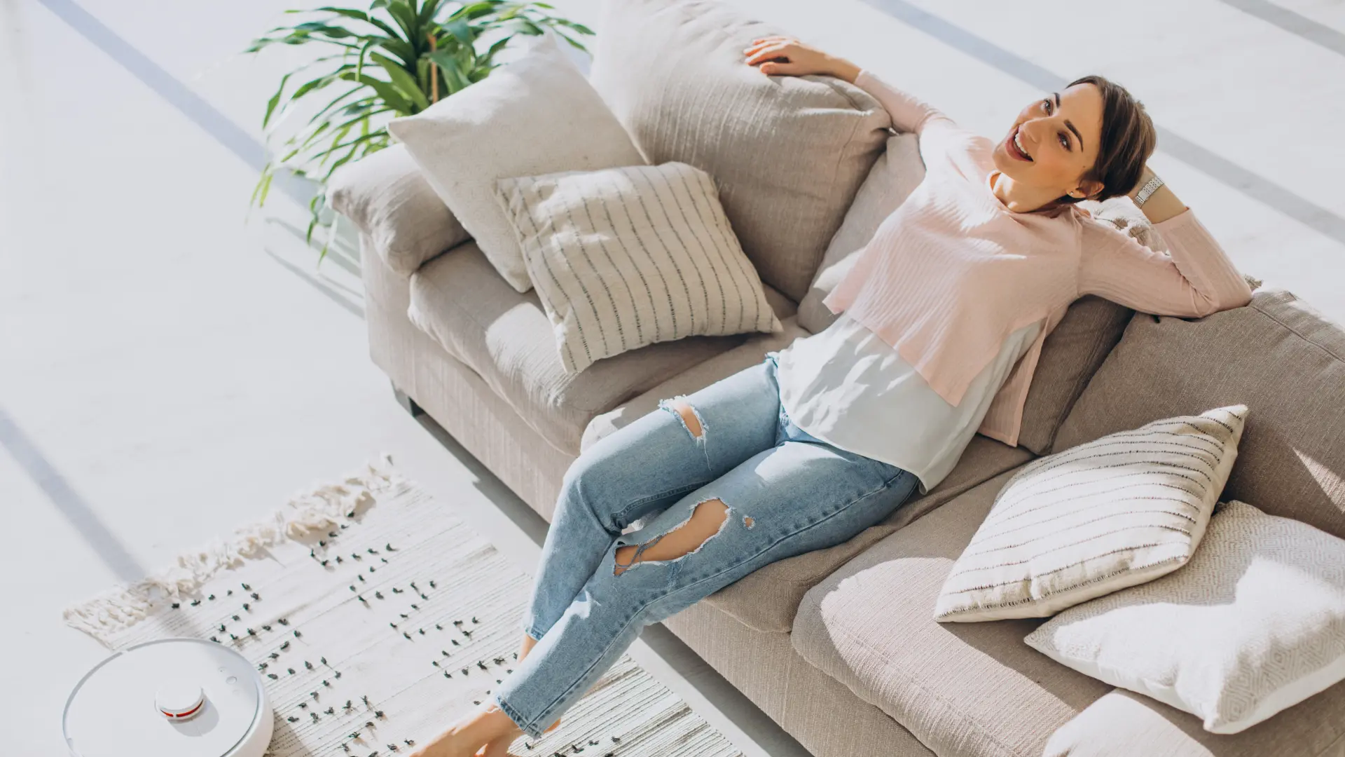 A woman relaxing in a fresh, air-conditioned home
